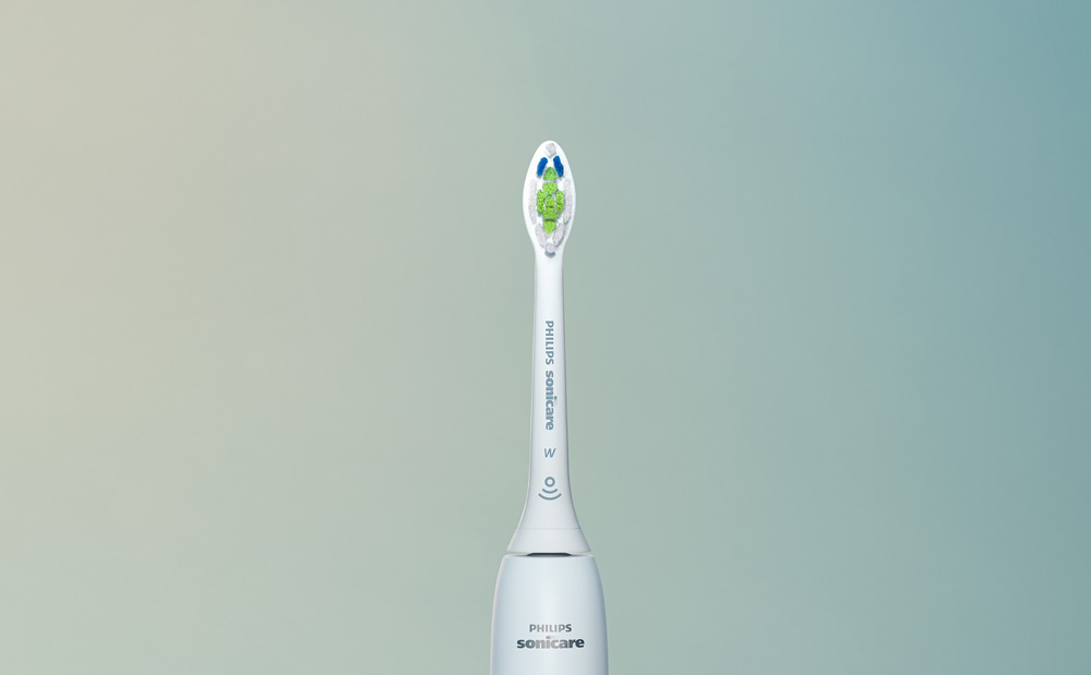 Grafika przedstawiająca górną część szczoteczki sonicznej Philips Sonicare.