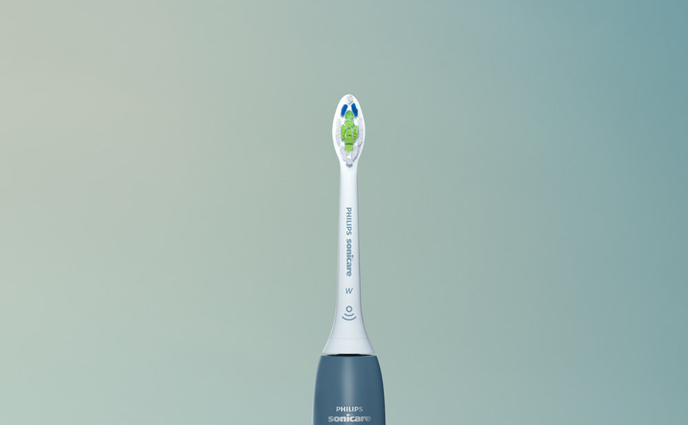 Grafika przedstawiająca górną część szczoteczki sonicznej Philips Sonicare.