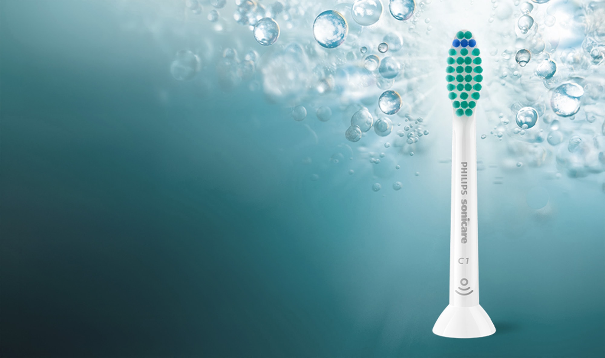 Biała końcówka z włóknami w kolorze turkusowym i granatowym.