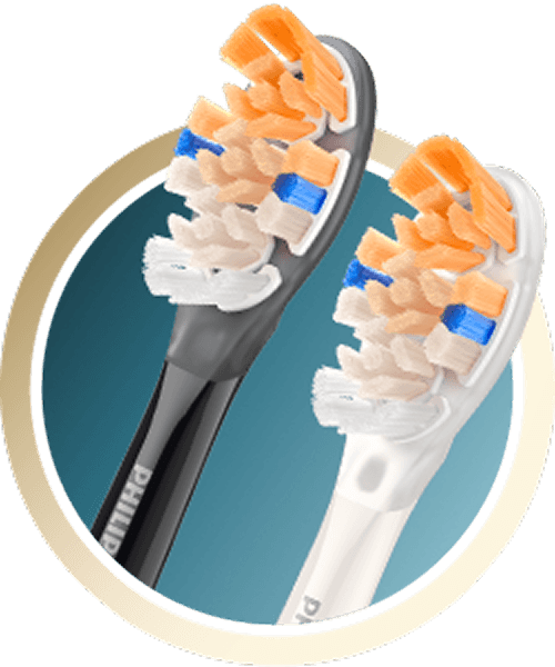 Dwie końcówki (czarna i biała) z włóknami w kolorze pomarańczowym, białym i granatowym.