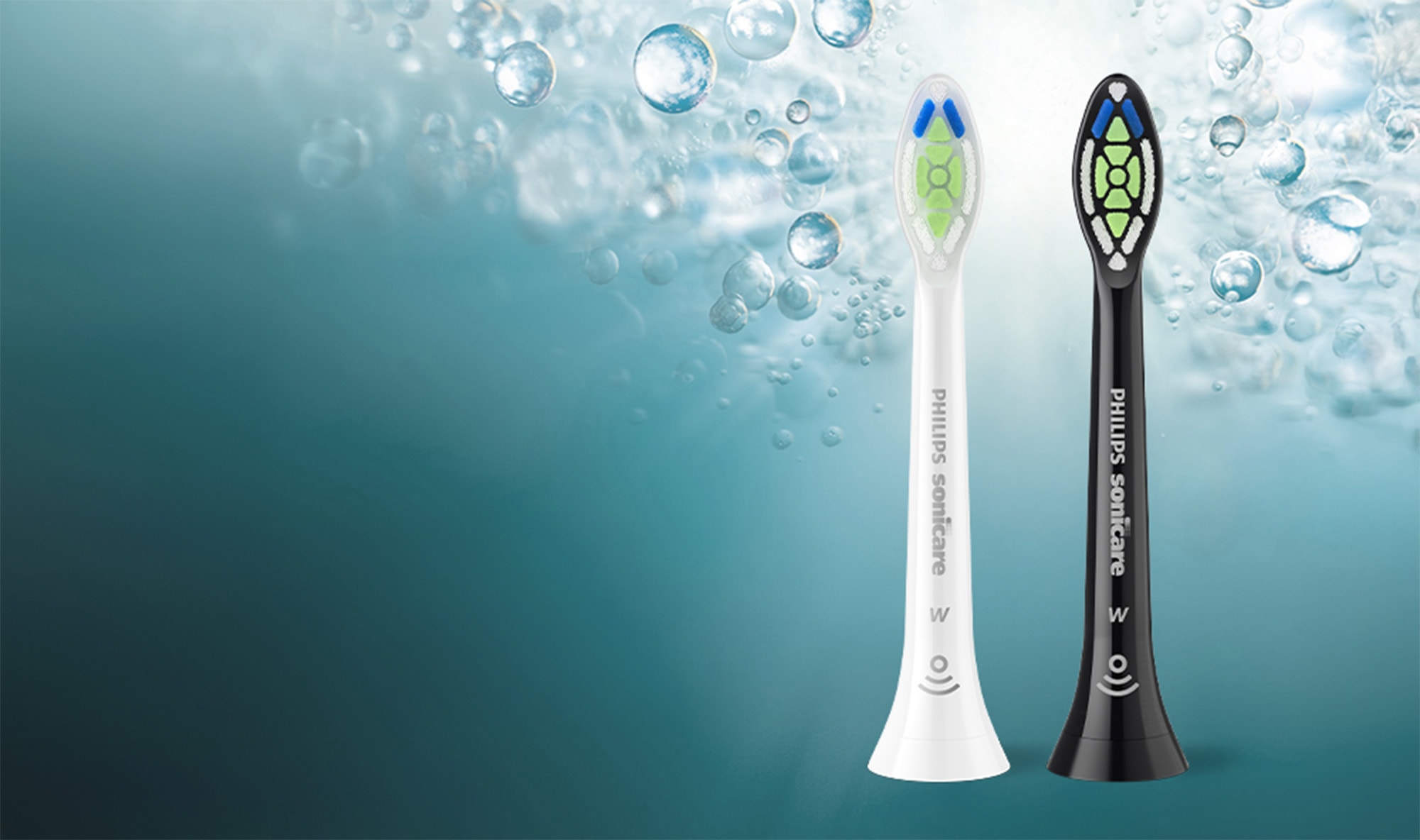 Dwie końcówki (czarna i biała) z włóknami w kolorze białym, granatowym i zielonym.